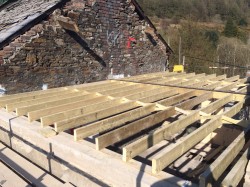 Timber floor joist with traditional herin bone strutting 