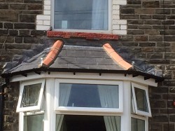 New slate roof including lead work and upvc fascias and guttering 