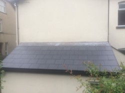After new fibre cement slates and lead work 